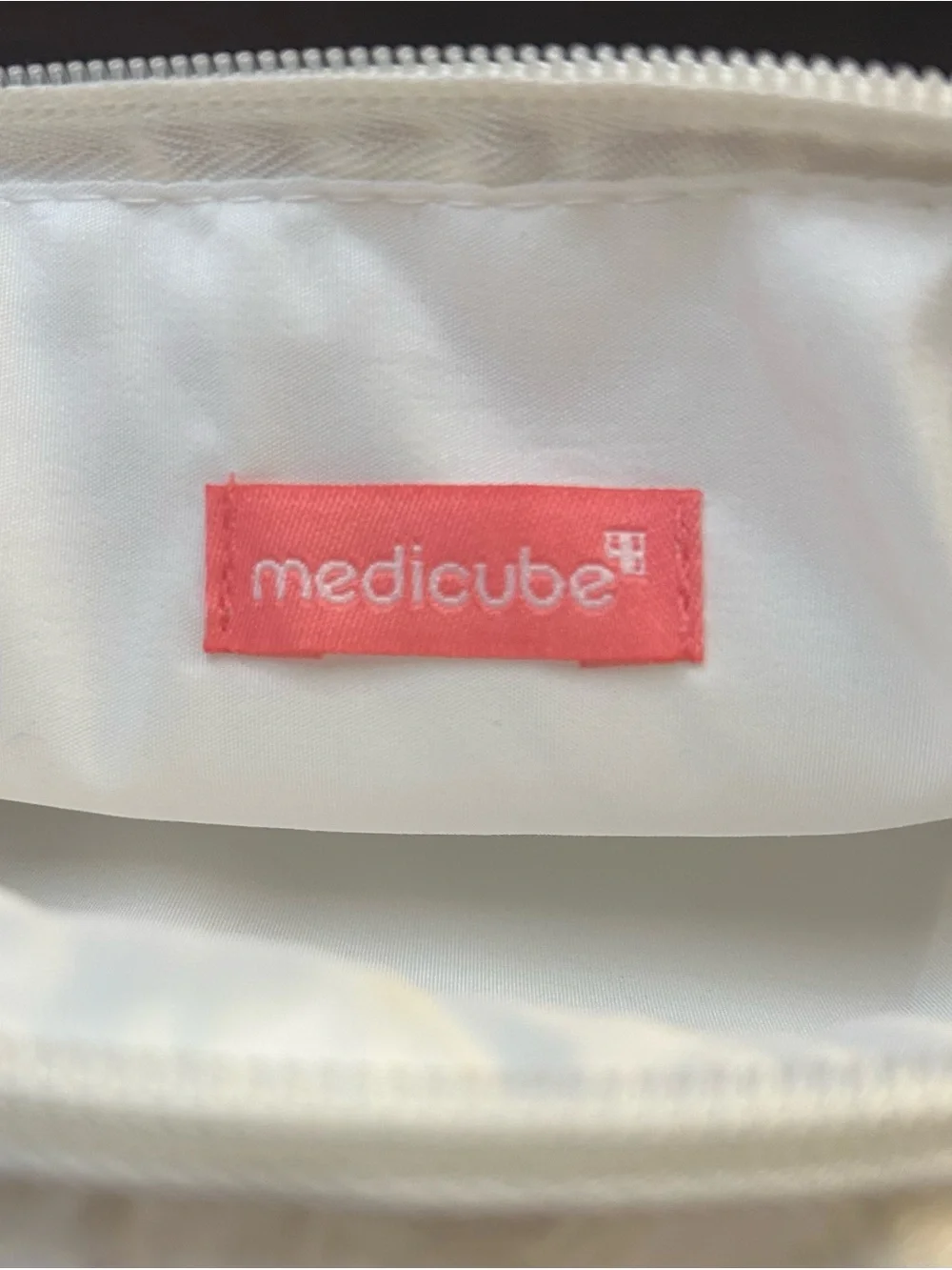Medicube White Quilted Makeup Bag w/ Ruffles